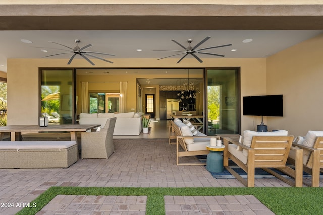 view of patio featuring outdoor lounge area and ceiling fan