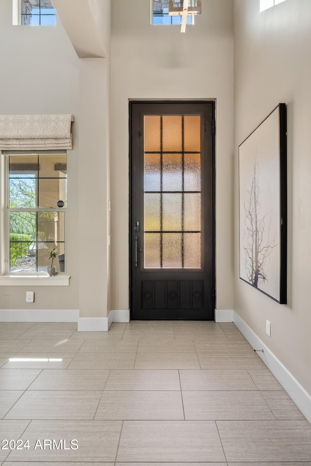 view of tiled foyer entrance