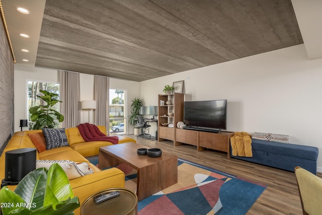 living room featuring recessed lighting and wood finished floors