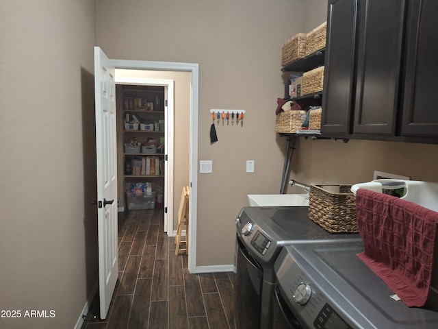 10773 W Prickly Pear Trl, Peoria, AZ 85383 - laundry room with cabinet space, washing machine and dryer, and dark wood-type flooring