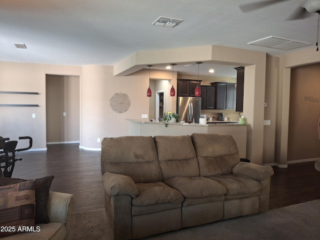 10773 W Prickly Pear Trl, Peoria, AZ 85383 - living area with ceiling fan, dark wood-style floors, and recessed lighting