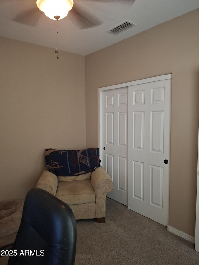 10773 W Prickly Pear Trl, Peoria, AZ 85383 - living area featuring carpet and ceiling fan