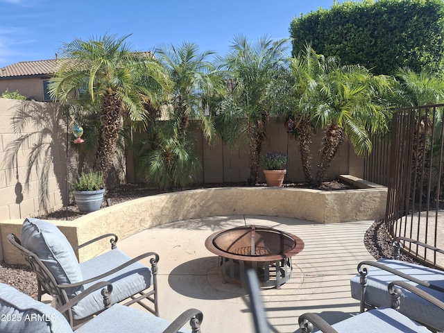 10773 W Prickly Pear Trl, Peoria, AZ 85383 - fenced backyard with a fire pit