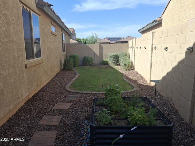 10773 W Prickly Pear Trl, Peoria, AZ 85383 - fenced backyard featuring a garden