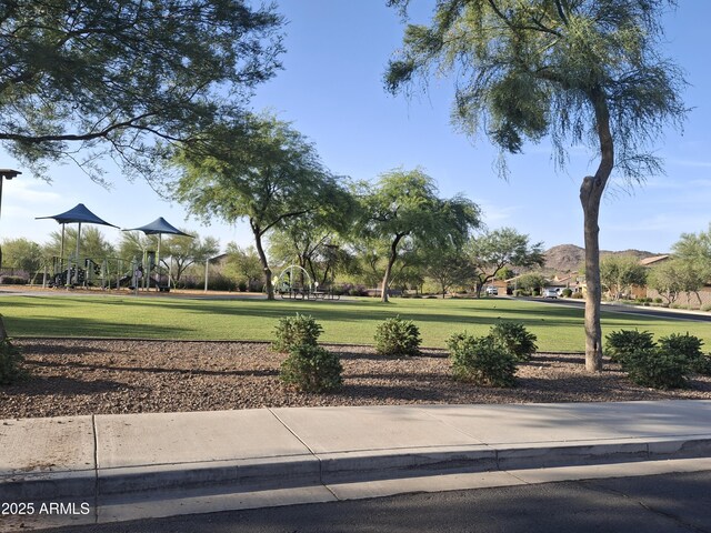 10773 W Prickly Pear Trl, Peoria, AZ 85383 - surrounding community featuring a lawn
