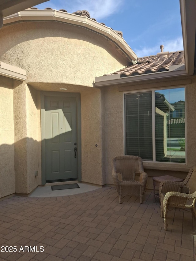 10773 W Prickly Pear Trl, Peoria, AZ 85383 - entrance to property featuring stucco siding and a patio