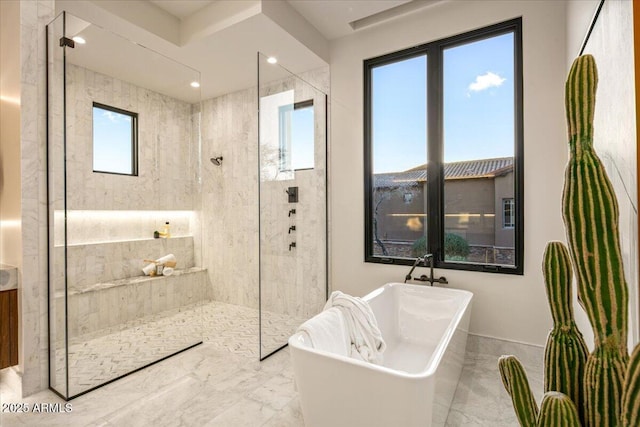 full bathroom with recessed lighting, a freestanding tub, marble finish floor, and walk in shower