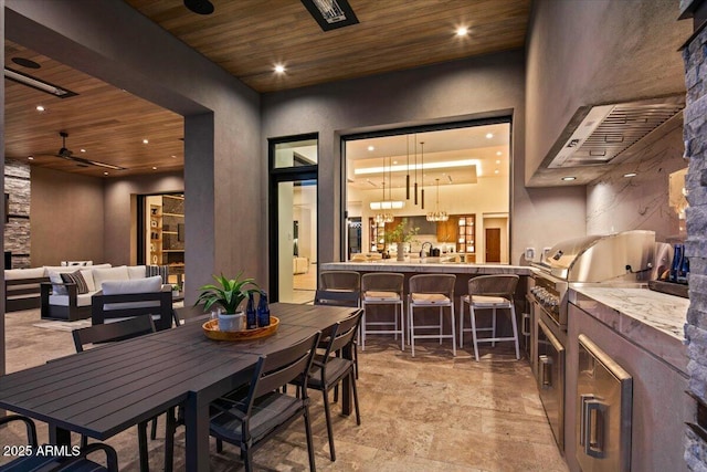 wine area featuring a ceiling fan, recessed lighting, wood ceiling, and stone finish flooring