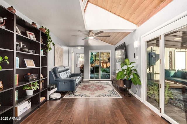 sunroom / solarium with ceiling fan, wood ceiling, vaulted ceiling, and a wealth of natural light