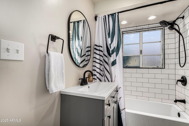 full bathroom with shower / tub combo and vanity