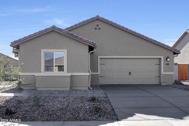 view of front of property featuring a garage