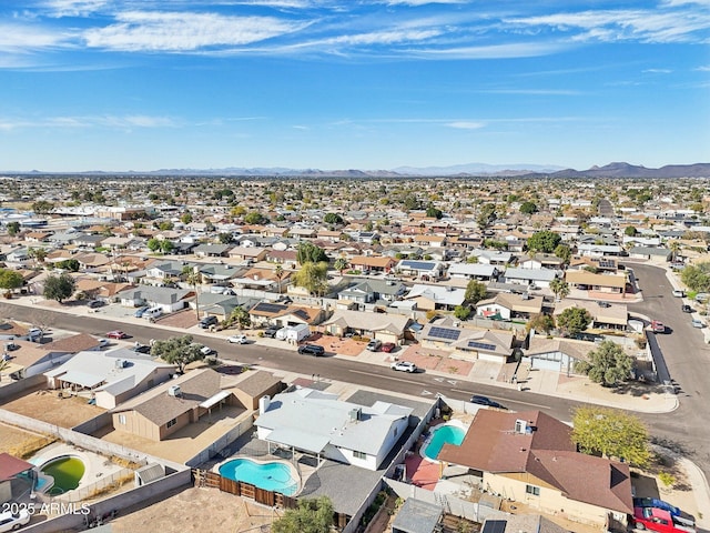 birds eye view of property with a residential view and a mountain view