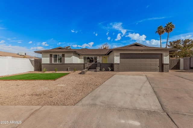 single story home featuring a garage