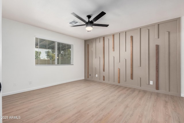 unfurnished bedroom with light hardwood / wood-style floors and ceiling fan