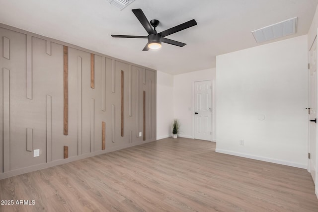 unfurnished bedroom featuring ceiling fan and light wood-type flooring