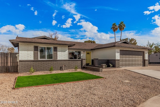 ranch-style home with a garage