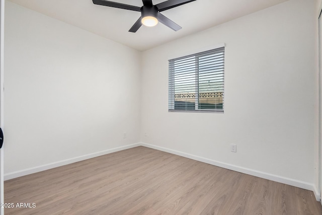 unfurnished room with light wood-type flooring and ceiling fan