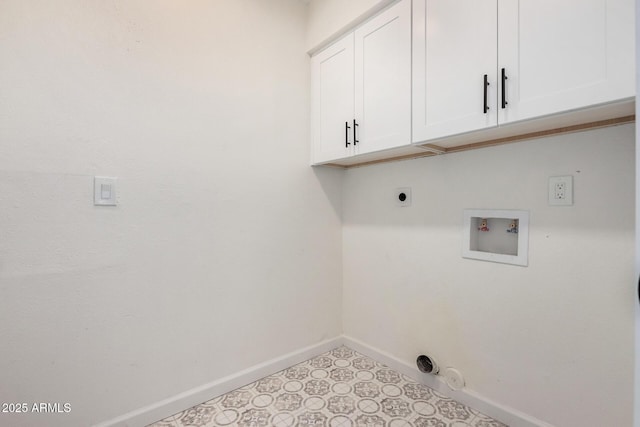 laundry room with washer hookup, electric dryer hookup, and cabinets