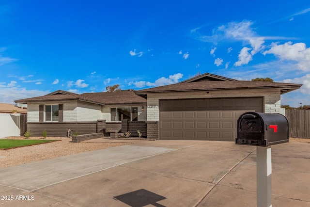 ranch-style home with a garage