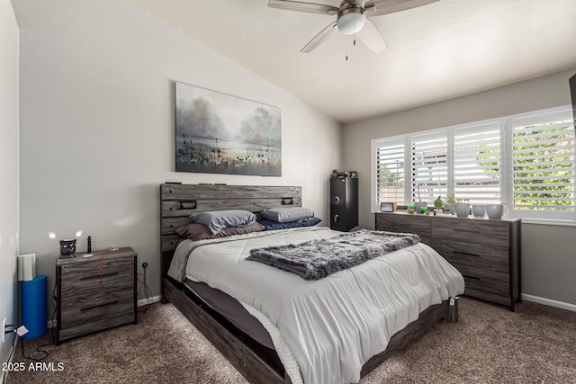 bedroom featuring carpet flooring, a ceiling fan, baseboards, and vaulted ceiling