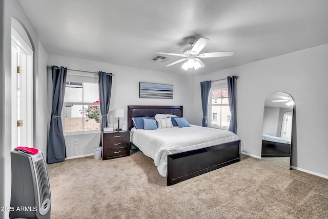 450 W Mountain Sage Dr, Phoenix, AZ 85045 - carpeted bedroom with a ceiling fan and baseboards