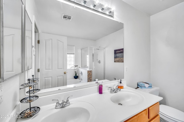 450 W Mountain Sage Dr, Phoenix, AZ 85045 - bathroom with a shower stall, toilet, double vanity, and a bath