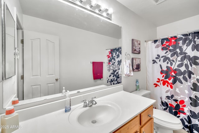 450 W Mountain Sage Dr, Phoenix, AZ 85045 - full bath with toilet, vanity, and a shower with shower curtain