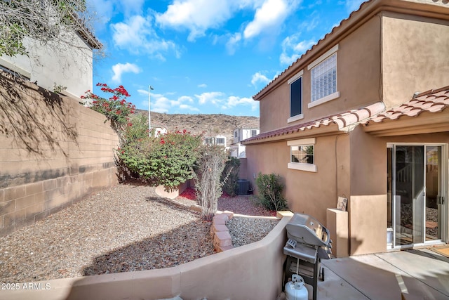 450 W Mountain Sage Dr, Phoenix, AZ 85045 - fenced backyard featuring central air condition unit, a patio, and a mountain view