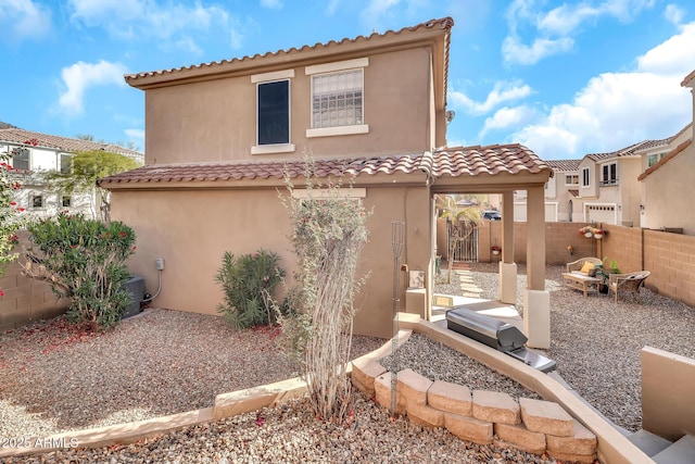 450 W Mountain Sage Dr, Phoenix, AZ 85045 - rear view of house featuring stucco siding