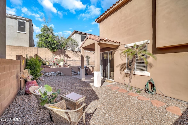450 W Mountain Sage Dr, Phoenix, AZ 85045 - fenced backyard featuring a patio