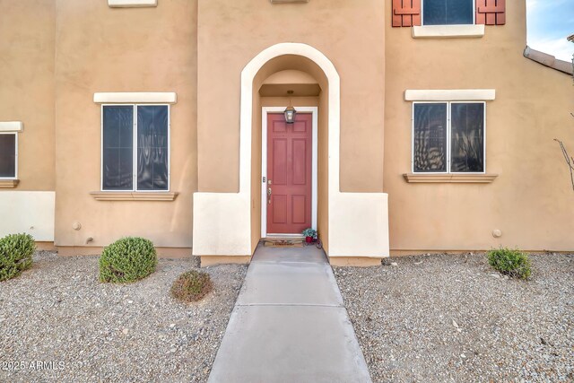 450 W Mountain Sage Dr, Phoenix, AZ 85045 - doorway to property featuring stucco siding