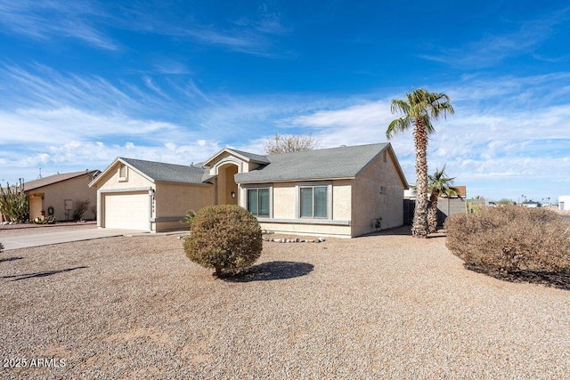 ranch-style home with a garage