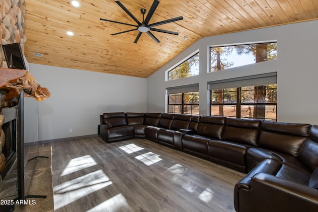 living room with dark wood-type flooring, ceiling fan, high vaulted ceiling, a fireplace, and wooden ceiling