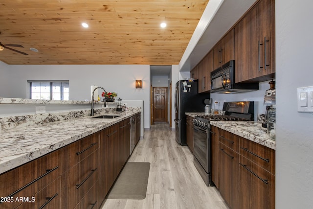 kitchen with sink, wood ceiling, light hardwood / wood-style flooring, black appliances, and light stone countertops