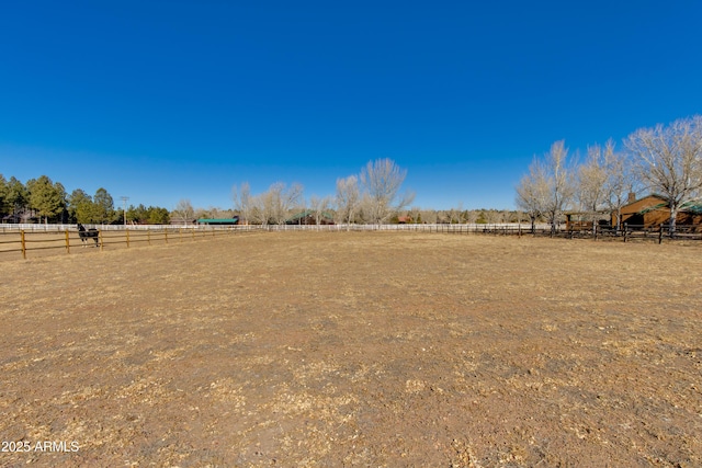 view of yard featuring a rural view