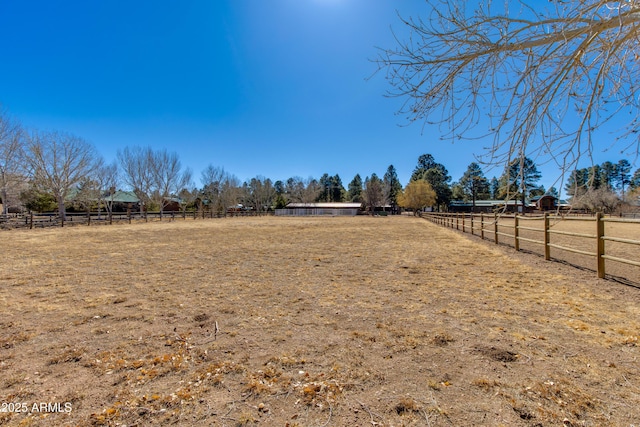 view of yard featuring a rural view