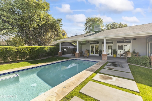 view of swimming pool featuring ceiling fan, french doors, cooling unit, and a patio