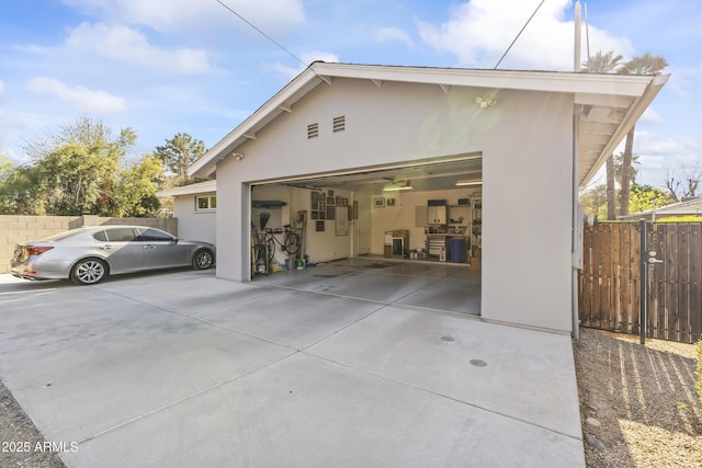 exterior space with a garage and an outdoor structure