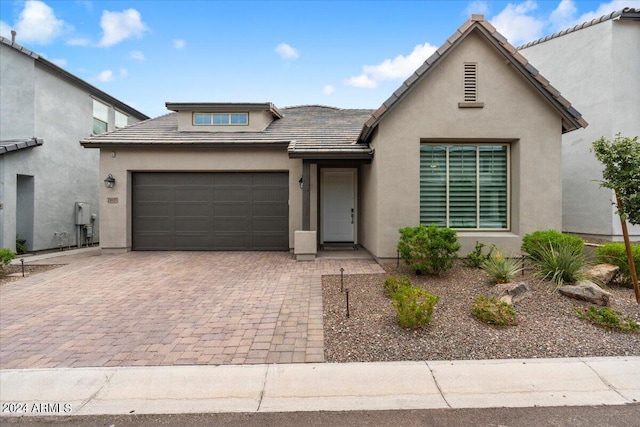 view of front of property with a garage