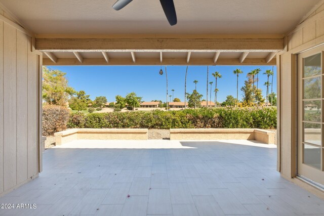 view of patio featuring ceiling fan