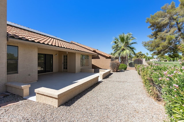 view of yard featuring a patio area and fence