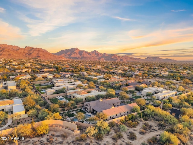 aerial view at dusk with a mountain view