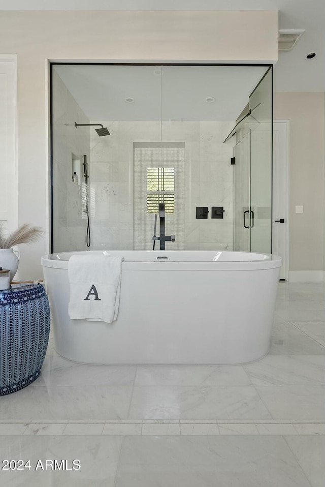 bathroom featuring a bath