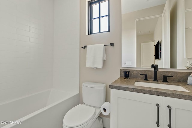 full bathroom featuring vanity,  shower combination, and toilet