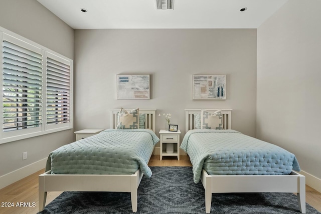 bedroom featuring light wood-type flooring