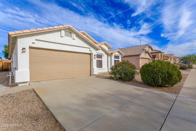 view of front of home with a garage