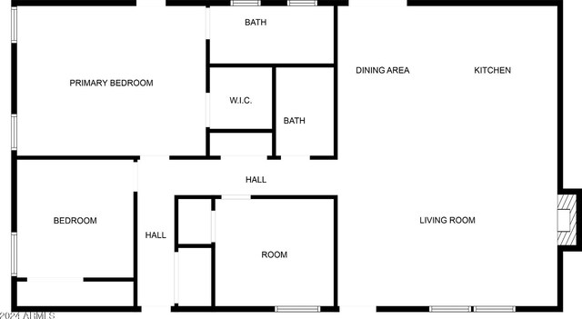 ranch-style house with a garage and a front yard