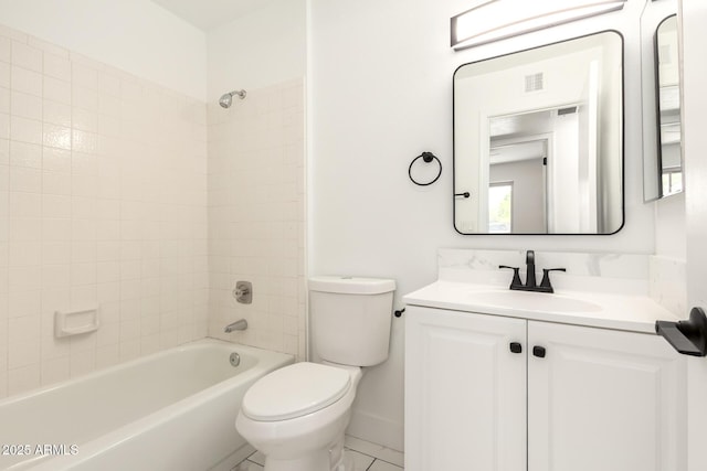 bathroom with washtub / shower combination, vanity, toilet, baseboards, and visible vents