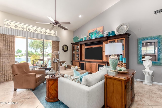 3166 N 158th Ave, Goodyear, AZ 85395 - living area with light tile patterned floors, ceiling fan, high vaulted ceiling, and a water view