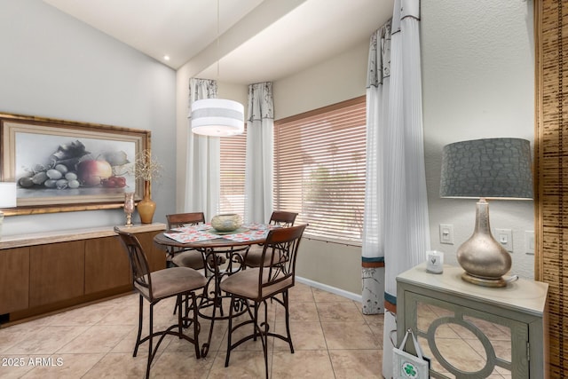 3166 N 158th Ave, Goodyear, AZ 85395 - dining area featuring light tile patterned floors and baseboards